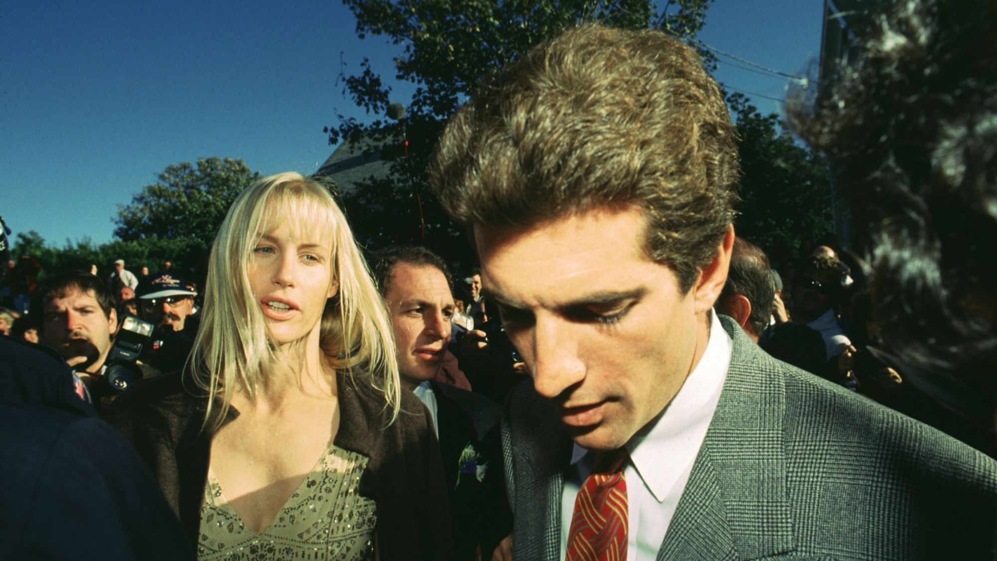 John F. Kennedy, Jr. and Daryl Hannah attend a wedding in Rhode Island