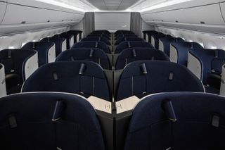 Aeroplane cabin with rows of seats, part of new Finnair Business Class by PriestmanGoode