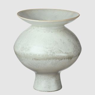 Sculptural vase with distressed finish