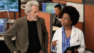 Gary Cole and Diona Reasonover in NCIS' bullpen set