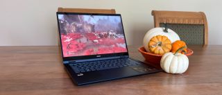 The Acer Swift Spin 14 AI currently running the game Clair Obscur: Expedition 33.