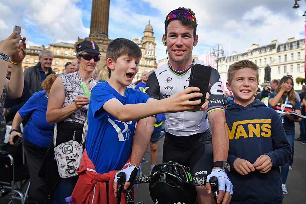 Mark Cavendish (Dimension Data) takes selfies with fans at the start of Tour of Britain