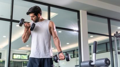 Man working out with dumbbells