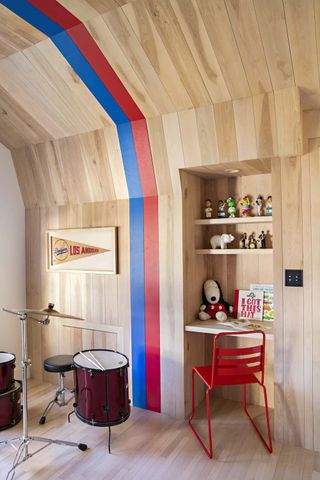 modern playroom with blue and red stripe down the wall