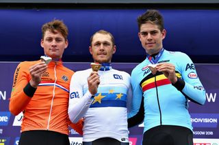 Mathieu van der Poel, Matteo Trentin and Wout van Aert show off their European Championship medals
