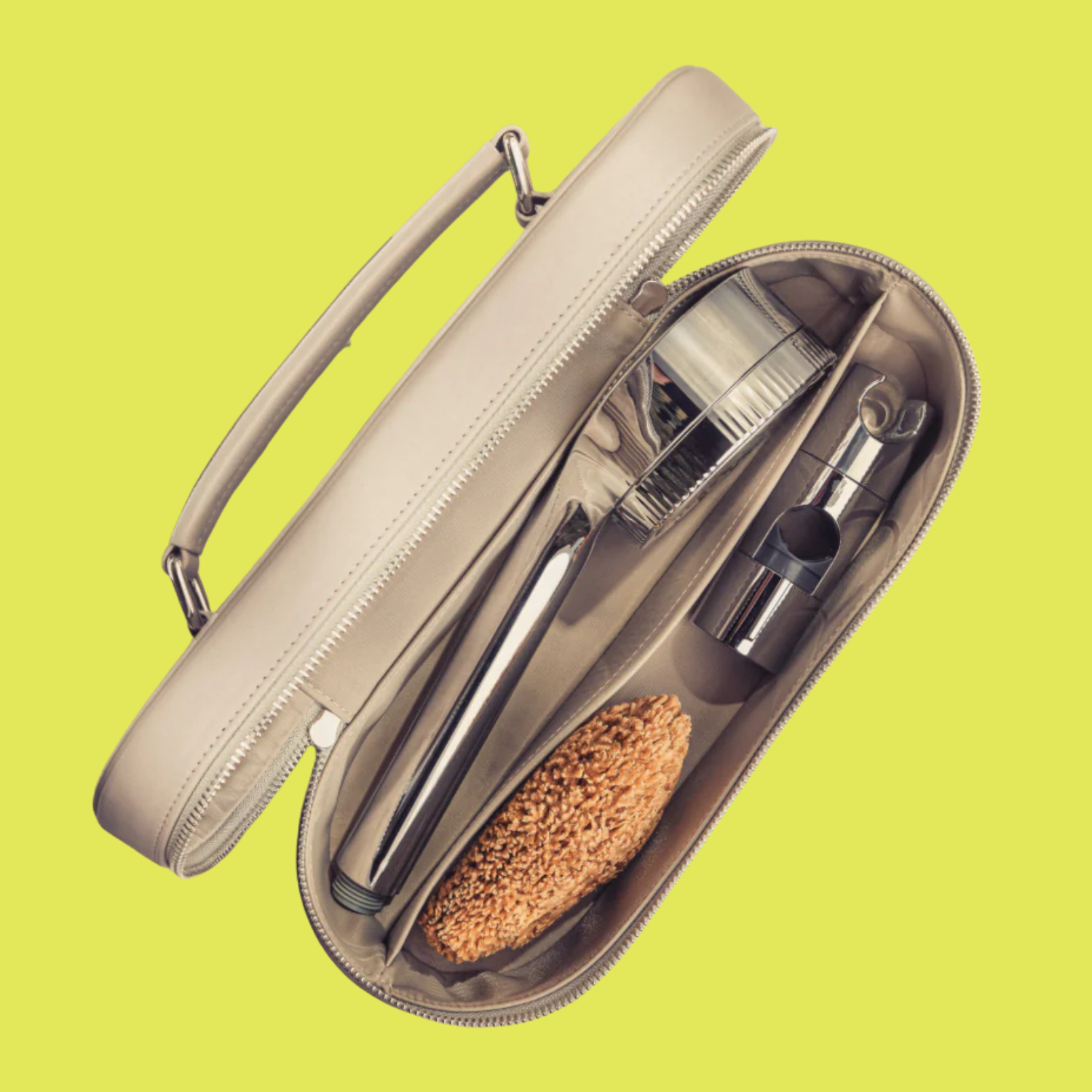 A vanity case with a shower filter, a sponge, and a shower holder