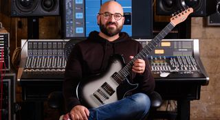 Adam "Nolly" Getgood Poses with his custom T-styles: his new collaboration with Bare Knuckle brings us a PAF-alike with more output, designed for the player of today's tone preferences.