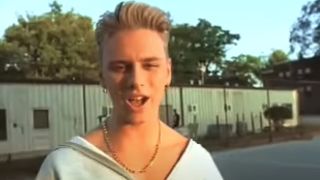 Close-up of Jeremy Jordan singing in music video on Beavis and Butt-Head