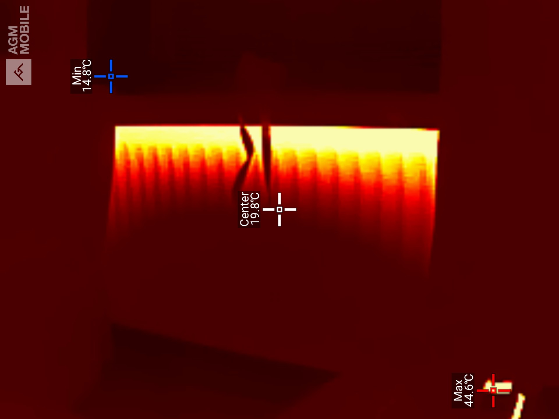 A thermal image of a radiator in use, showing heat concentrated along the top edge with a maximum detected temperature of 44.6&deg;C in the lower right foreground.