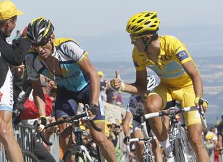 Cool as a cucumber: Alberto Contador (Astana) speaks to Lance Armstrong (Astana) on the way up Mont Ventoux