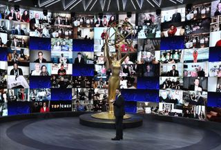 Jimmy Kimmel stands in front of the live feeds of the 2020 Emmy nominees.