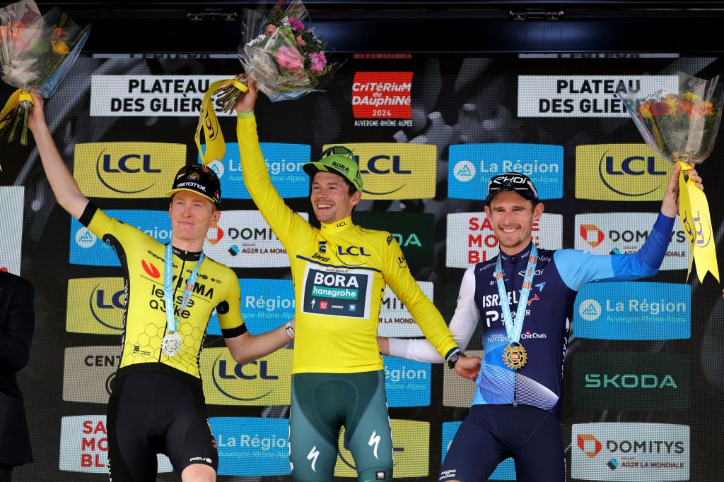 Critérium du Dauphiné final podium (l-r): second-placed Matteo Jorgenson (Visma-Lease a Bike), winner Primož Roglič (Bora-Hansgrohe) and third-placed Derek Gee (Israel-Premier Tech)