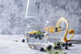 orange peel infused water with blueberries