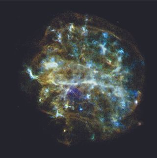 While it might look like a cosmic, space brain, this is actually an image of G292.0+1.8, a young, oxygen-rich remnant from a supernova that scientists think has a pulsar at its center, surrounded by outflowing material. The image, taken by NASA's Chandra X-ray Observatory Observations using Chandra have created strong evidence that there is a pulsar in G292.0+1.8. Using observations like this, astronomers can study the connection between pulsars (a magnetized, rotating neutron star that emits electromagnetic radiation) and massive stars. In this image, you can see a shell of expanding gas 36 light-years across. The gas contains elements including oxygen, neon, magnesium, silicon and sulfur.