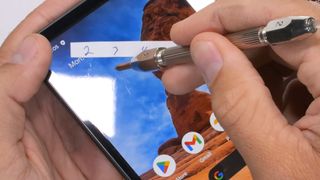 A screenshot of JerryRigEverything's Google Pixel Fold durability test, showing scratch test results on the inner display