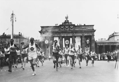 The torch run during the 1936 Olympics in Berlin
