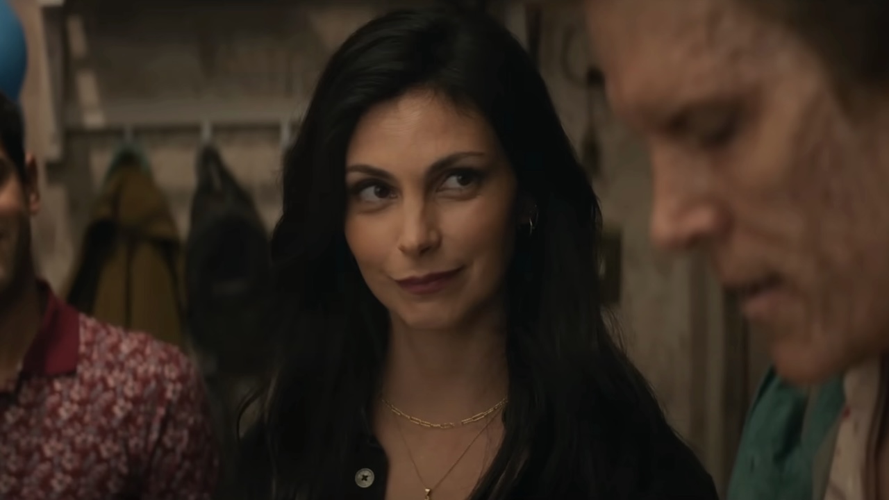 Vanessa looking over at Wade Wilson before he blows out his birthday candles in Deadpool & Wolverine