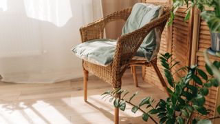 Bright room with a wicker chair