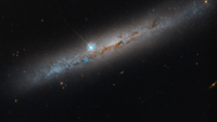 The side-view of a spiral galaxy.