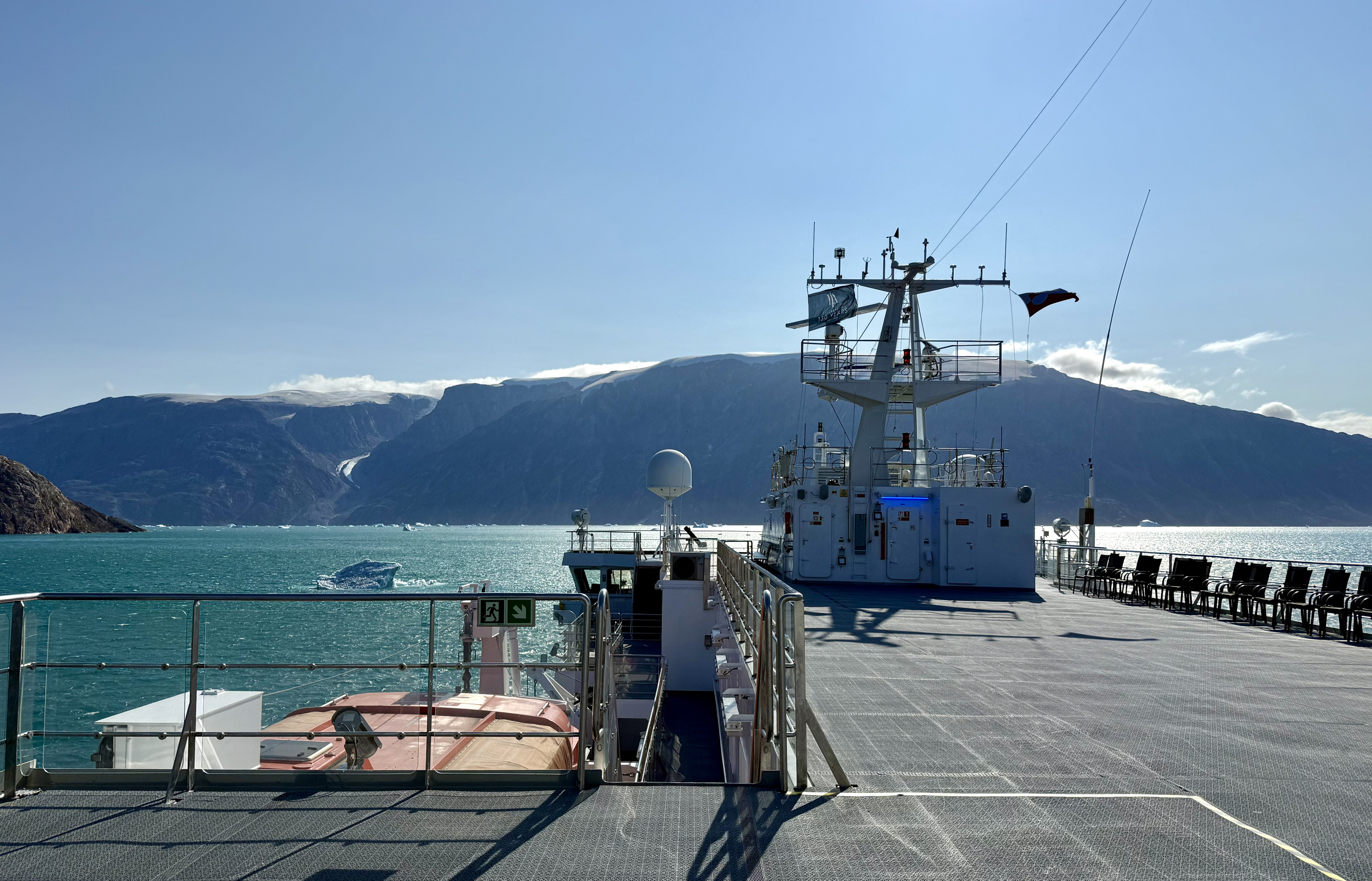 I sailed to Greenland for a total solar eclipse — what I saw left me speechless 4 MyCelestialApp deck of ms spitsbergen, with blue skies and turquoise water below
