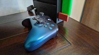 Nintendo Switch Dock with 8Bitdo adapter and Xbox One controller