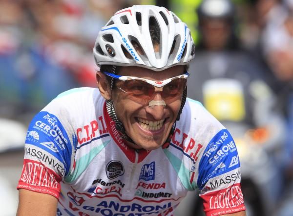 Franco Pellizotti grins after winning his first race back from a doping ban
