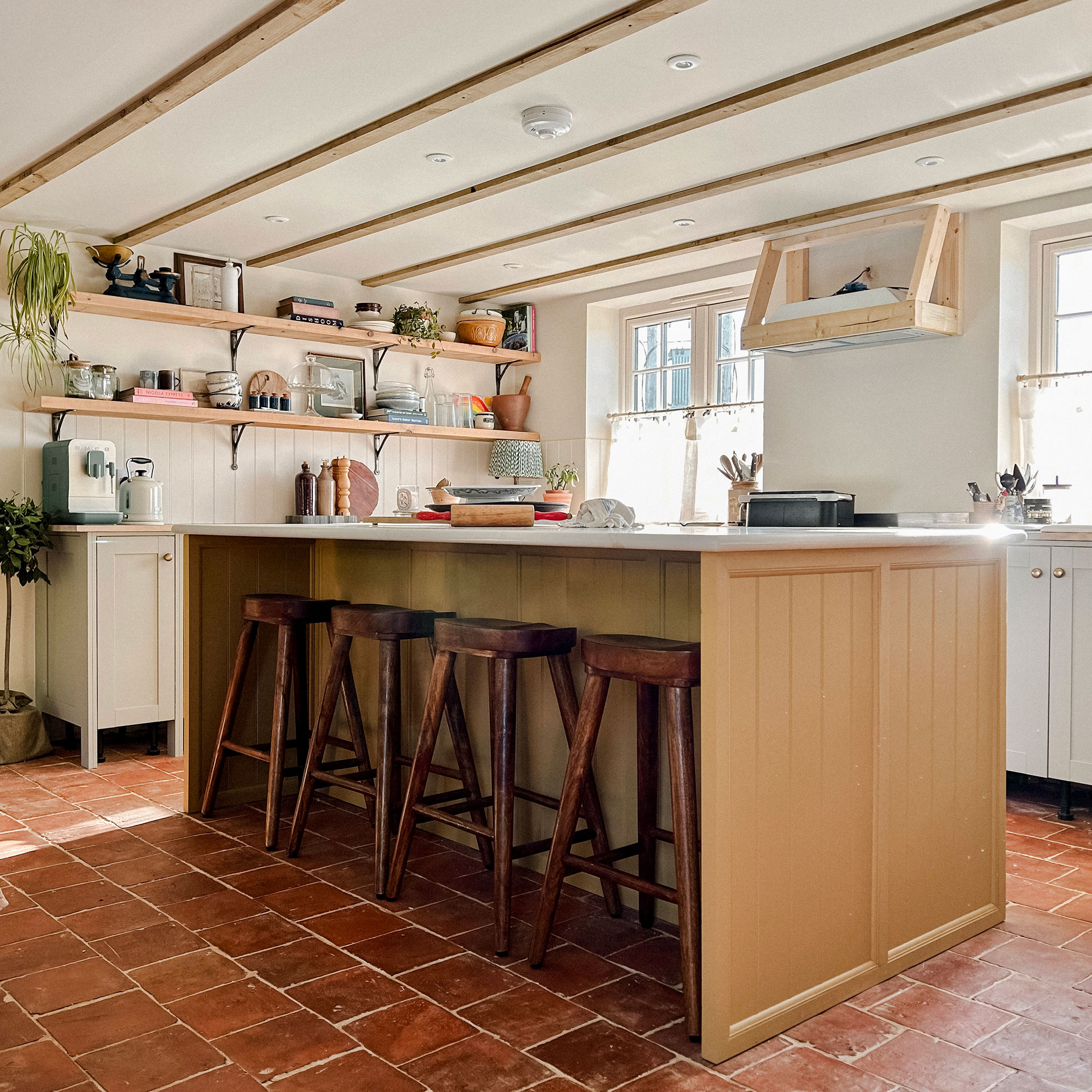 Shaker style kitchen with yellow island