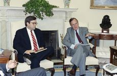 William Barr and George H.W. Bush.