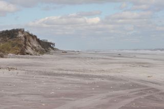 Hurricane Sandy severely eroded dunes and lowered the beach elevation on Fire Island in New York.