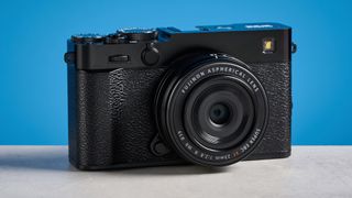Fujifilm X-E5 against a blue background
