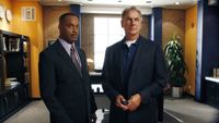 Vance and Gibbs looking at a TV monitor in Vance's office in NCIS