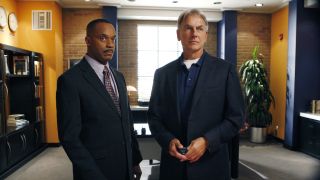 Vance and Gibbs looking at a TV monitor in Vance's office in NCIS