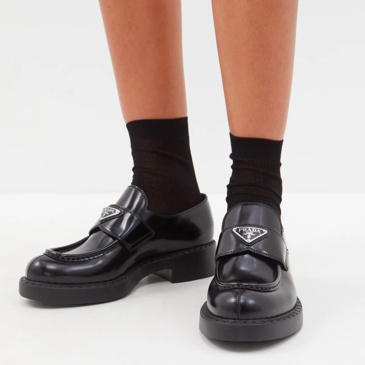 PRADA Logo-plaque leather loafers