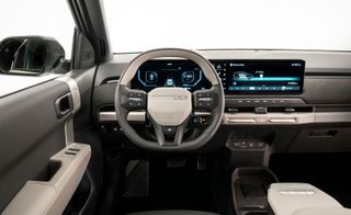 Kia EV3 electric crossover driver's view of steering wheel and dashboard