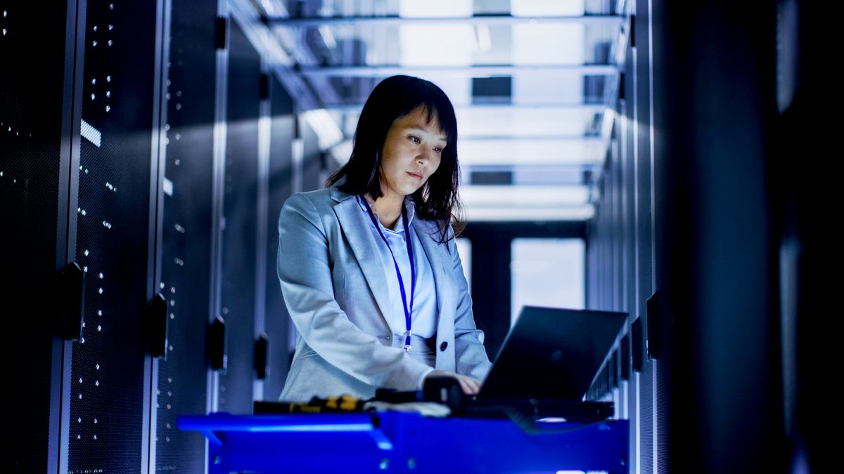 A woman working in a data centre