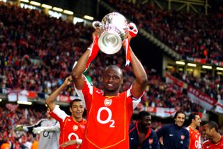 Captain Patrick Vieira celebrates with the FA Cup after Arsenal's victory over Manchester United in the 2005 final