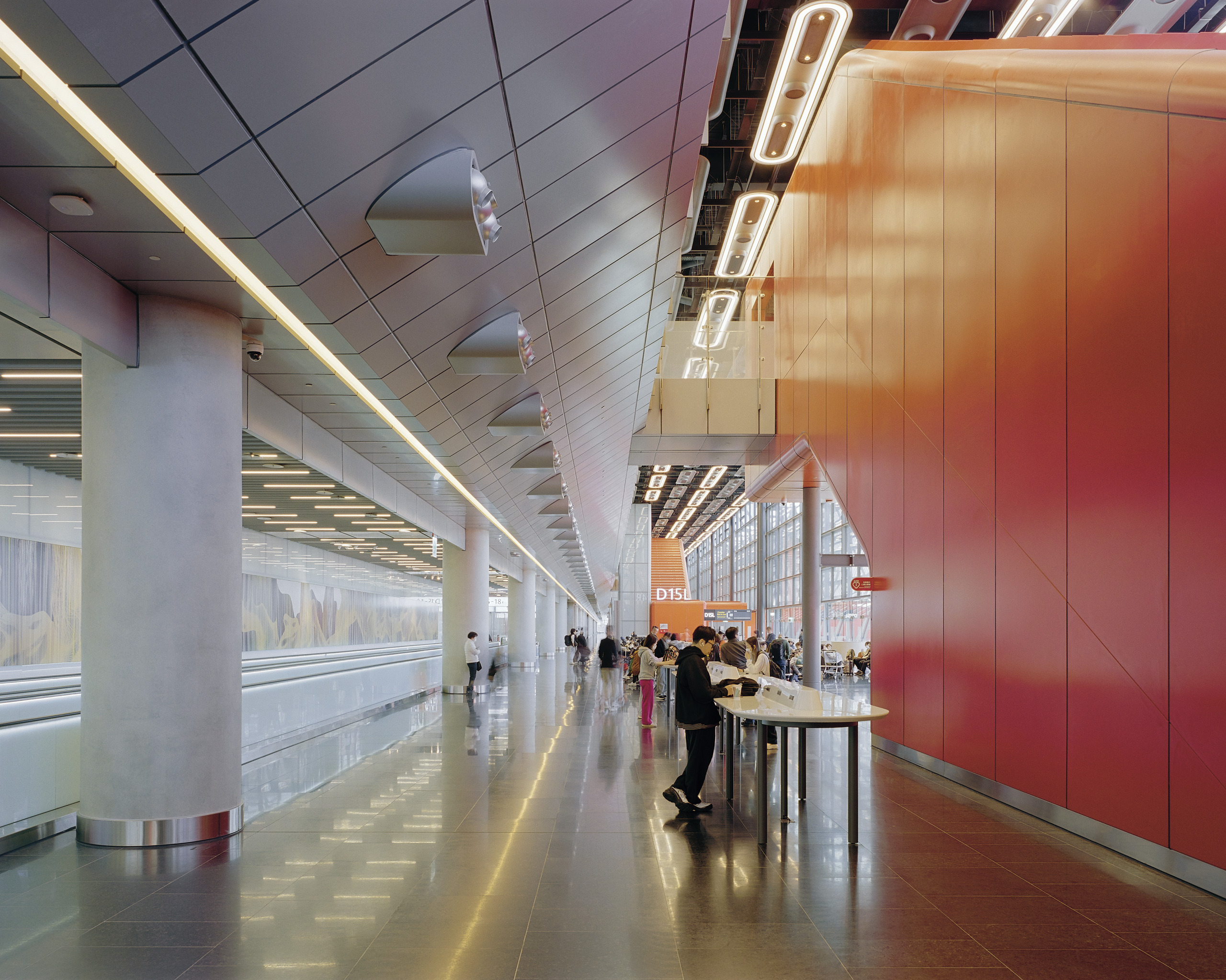 Generous aisle widths, clear sightlines and varying volumes ensure a calm and legible passenger experience