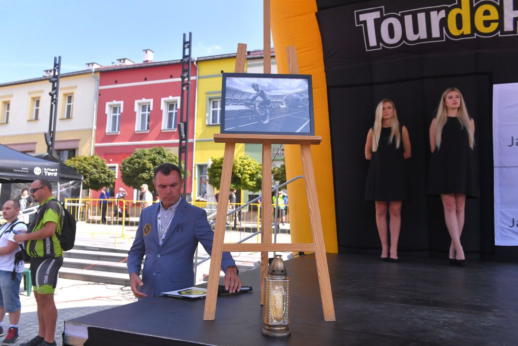 A candle was lit on stage below a photograph to remember Bjorg Lambrecht