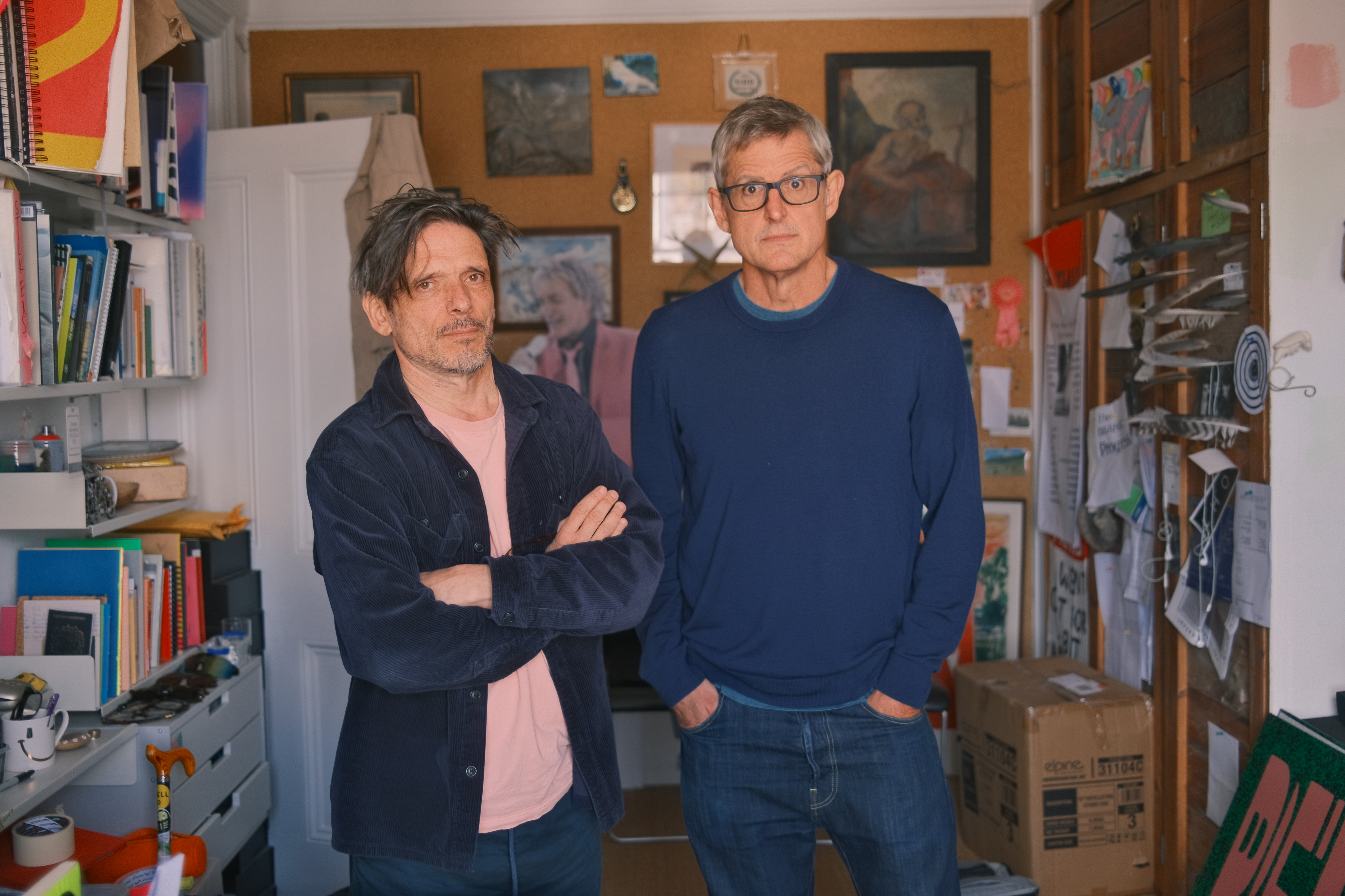 two men standing next to each other