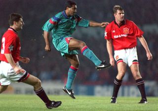 Romario takes a shot against Manchester United in the Champions League in October 1994.