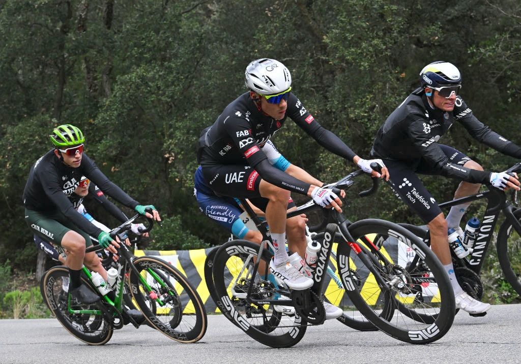 SANT FELIU DE GUIXOLS, SPAIN - MARCH 24: (L-R) Juan Ayuso of Spain and UAE Team Emirates-XRG and Enric Mas of Spain and Movistar Team compete during the 104th Volta Ciclista a Catalunya 2025, Stage 1 a 178.6km stage from Sant Feliu de Guixols to Sant Feliu de Guixols / #UCIWT / on March 24, 2025 in Sant Feliu de Guixols, Spain. (Photo by Szymon Gruchalski/Getty Images)