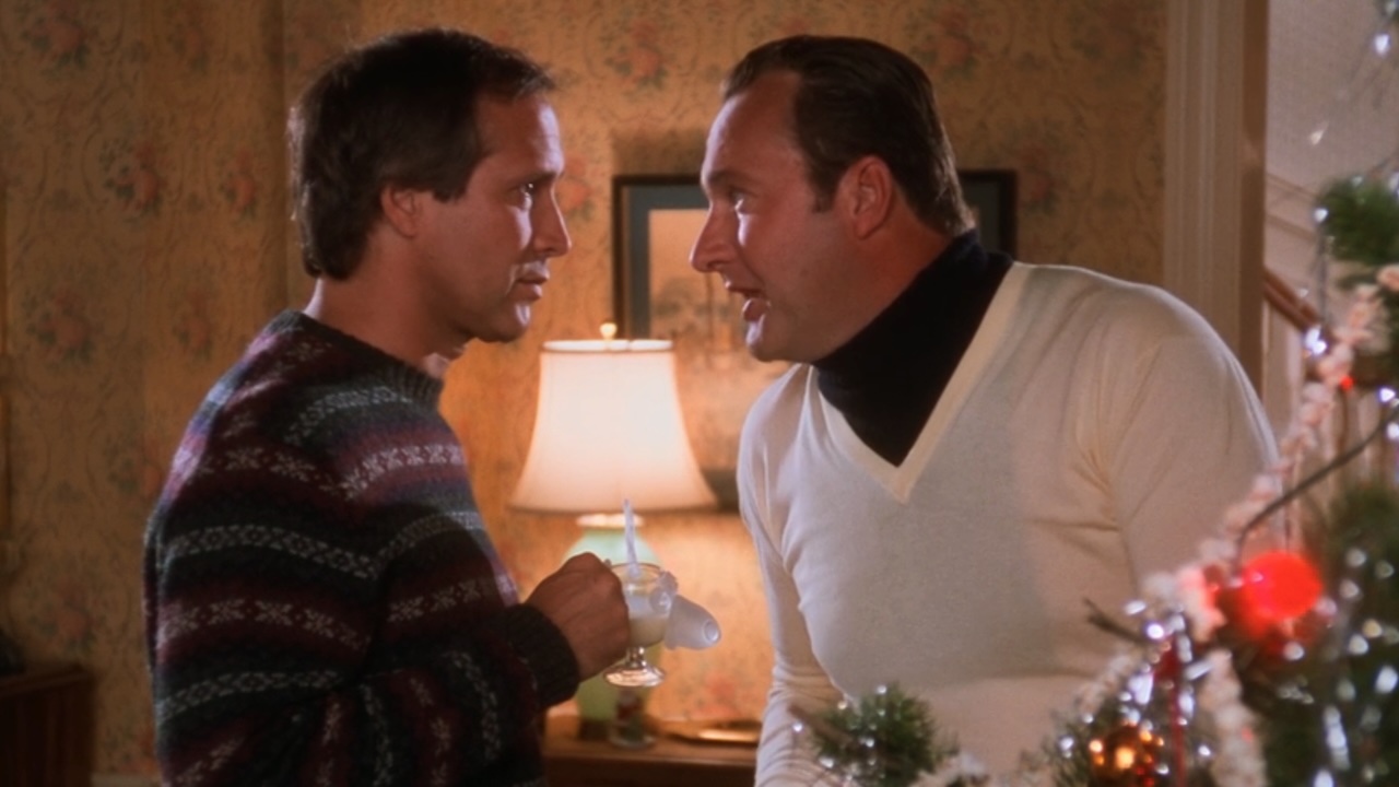 Eddie leaning in to talk to Clark in Christmas Vacation