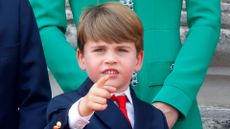  Prince Louis of Wales is pictured pointing while he watches an RAF flypast from the balcony of Buckingham Palace during Trooping the Colour on June 17, 2023 in London, England. 