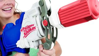 A girl holding the Super Soaker Hydra
