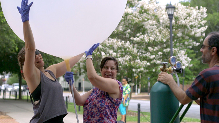 Hiscox and students with weather balloon