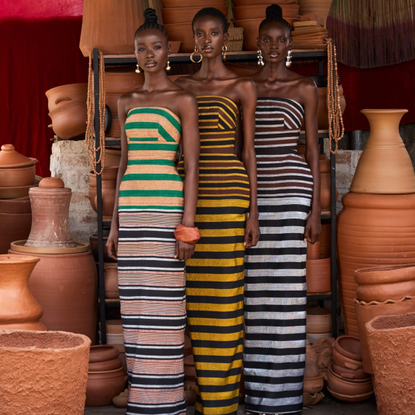 Hertunba three women wear striped dresses