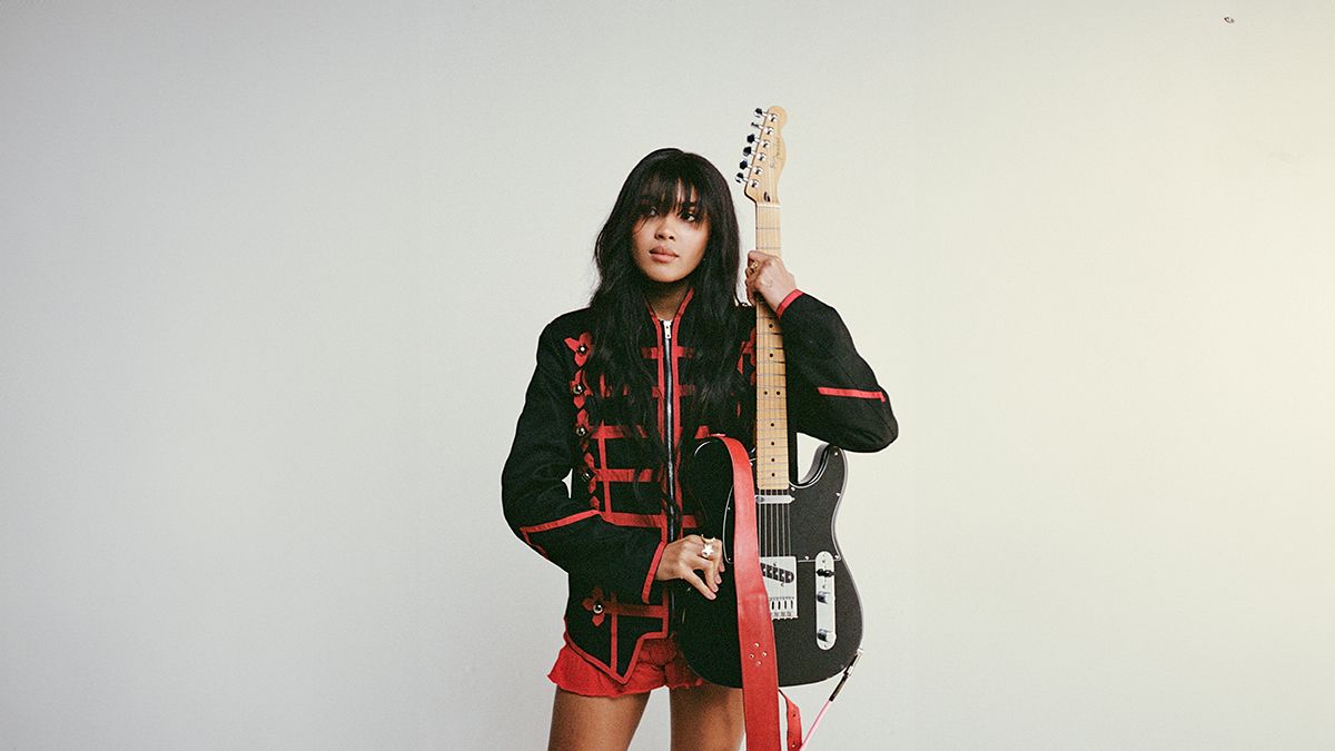 Aziya holding a Fender Tele