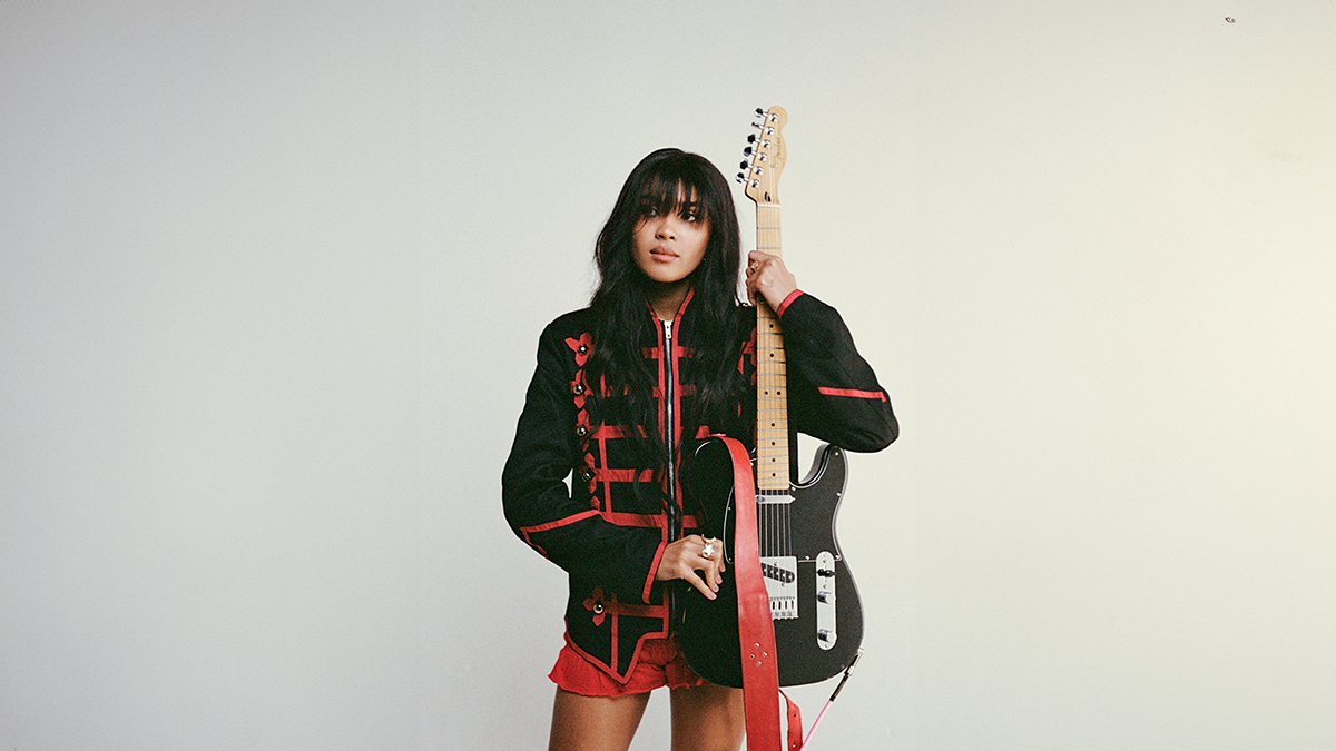 Aziya holding a Fender Tele