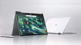 Two Asus Chromebook Flips on a grey background