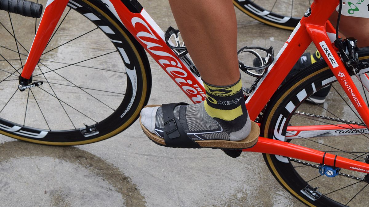 Lilian Calmejane wore unorthodox footwear to the sign on of one of the stages